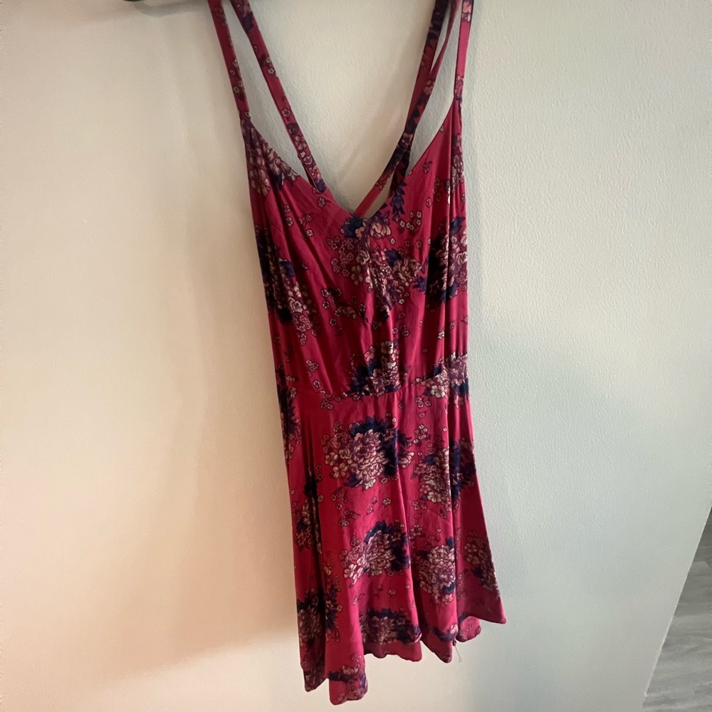 Red/Pink flowy dress with flower designs and low back